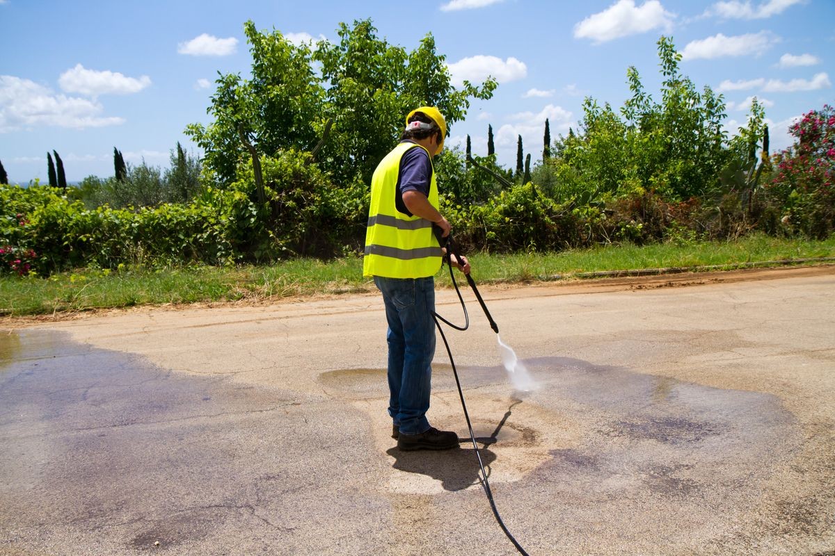 washing industrial floor in company premises